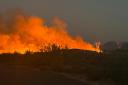 Air tankers and helicopters have joined nearly 200 firefighters battling a wildfire north-east of Phoenix, Arizona (Arizona Department of Forestry and Fire Management via AP)