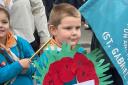 One beaver scout's home-made wreath says it all... 'Lest we forget'