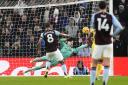 Crystal Palace goalkeeper Dean Henderson makes a penalty save from Aston Villa's Youri Tielemans during the Premier League match at Villa Park, Birmingham. Picture date: Saturday November 23, 2024.