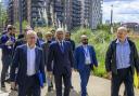 Mayor Lutfur Rahman (centre) on walkabout tour of the Poplar Riverside development