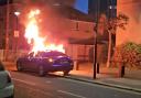 The blue Maserati was filmed alight on the corner of Roffey Street