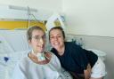 PIC FROM KENNEDY NEWS AND MEDIA (PICTURED: TINA BOND, 57, WITH HER DAUGHTER, ZOE REEVE, 28, IN SON ESPASES HOSPITAL AFTER HER TRACHEOTOMY WAS FITTED) A mum who suffered a brain aneurysm while showering on holiday is stranded in a Spanish hospital and