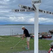 David at John O'Groats with first of 10,000 swings towards Land's End.