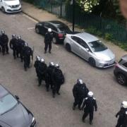 Met Police officers removed people from an address in Shadwell
