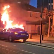 The blue Maserati was filmed alight on the corner of Roffey Street