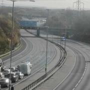 Motorcyclist fighting for life after crash with car on M25